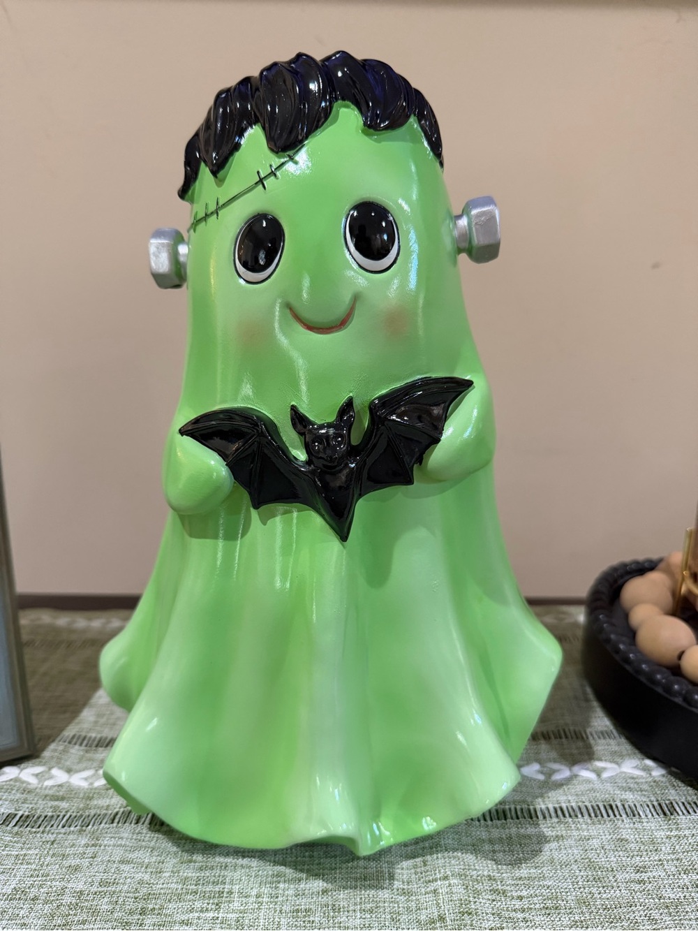 Green Frankenstein Ghost Figurine with Black Bat